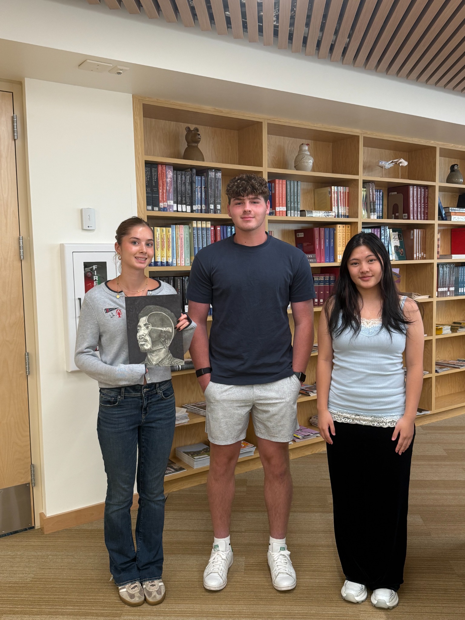 Jane Goode, Spencer Feldman, and Kaleigh Hermanto, the first-, second-, and third-place Westchester County winners in the HHREC student competition